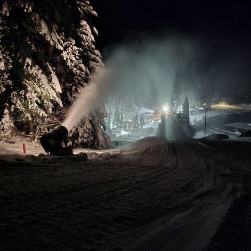 Snowgun running on lower Chak Chak at Mission Ridge at night.