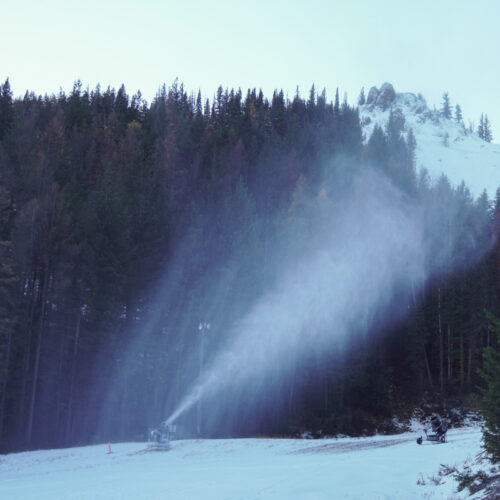 Snow gun producing cloud of snow on Mimi at Mission Ridge.