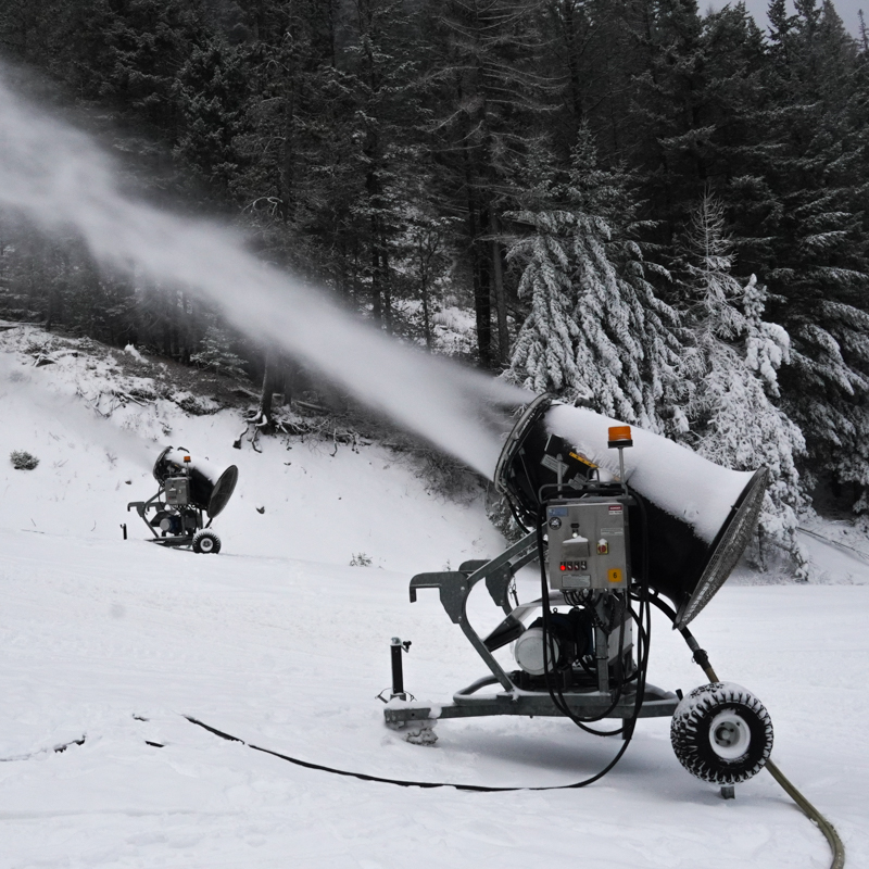 Two snow guns firing on the Mimi ski trail at Mission Ridge.