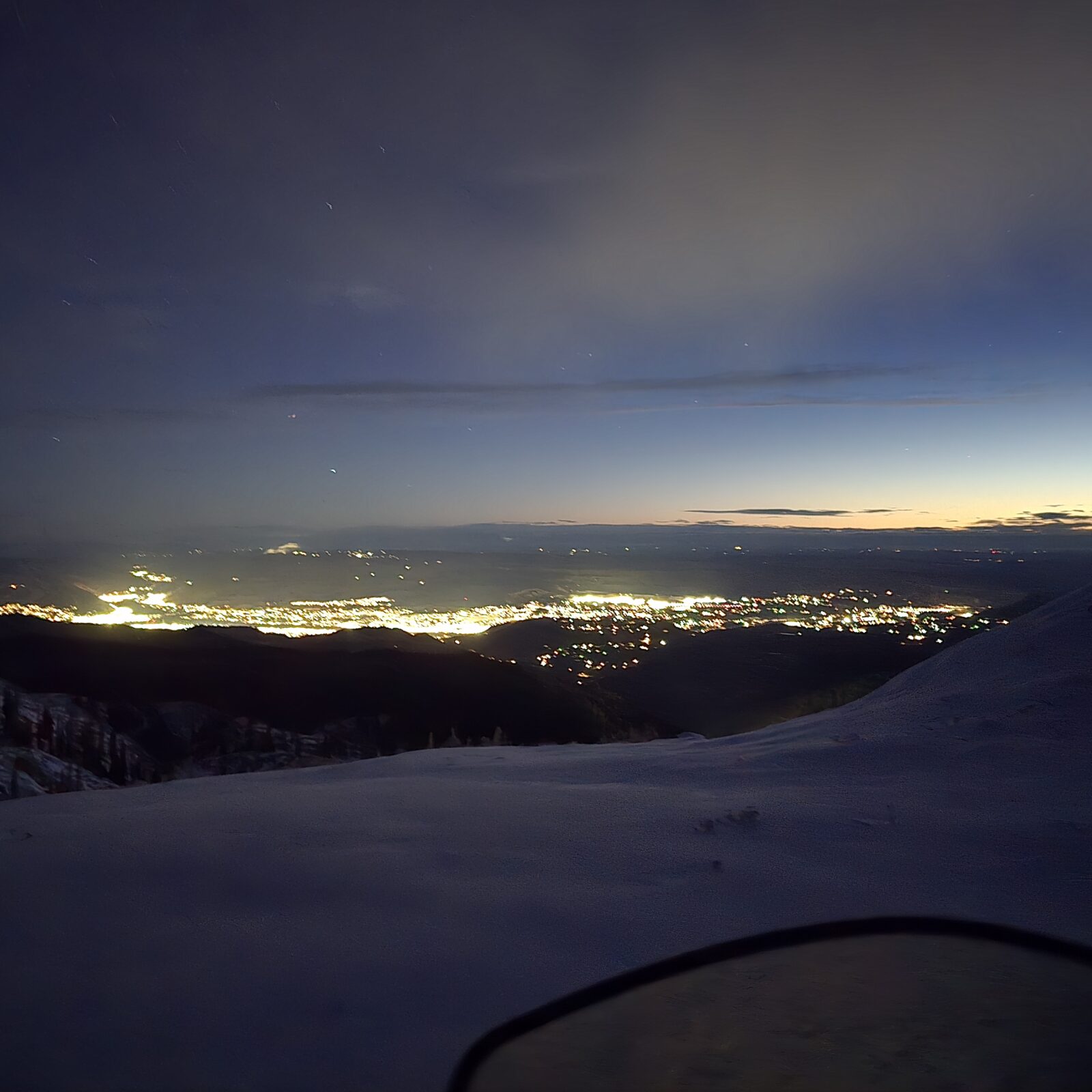 View of the city lights of Wenatchee from the top of Mission Ridge at night.