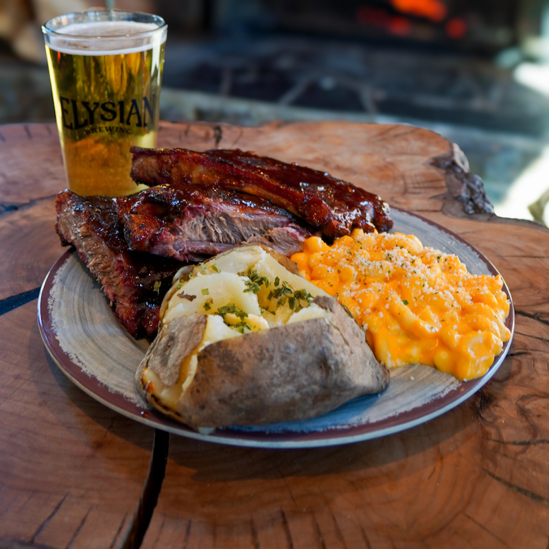 A meal of ribs, baked potato, and Mac and cheese with a beer in the Hampton Lodge at Mission Ridge.