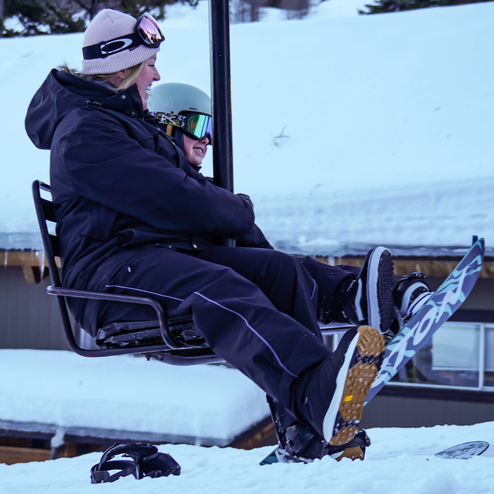 Mom and son ride up Chair 1