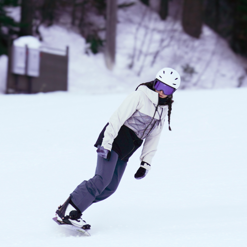 A snowboarder descends the Mimi Trail at Mission Ridge Ski and Board Resort.