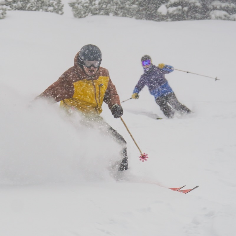 Two skiers enjoy fresh powder at Mission Ridge.